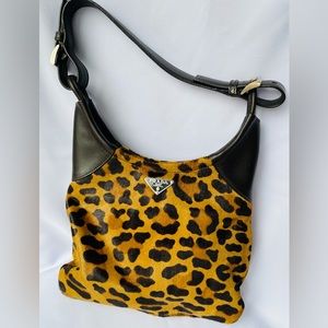 Prada pony hair and leather leopard print handbag